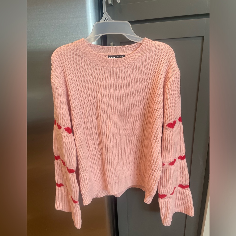 Womens small pink sweater with bell bottom sleeves